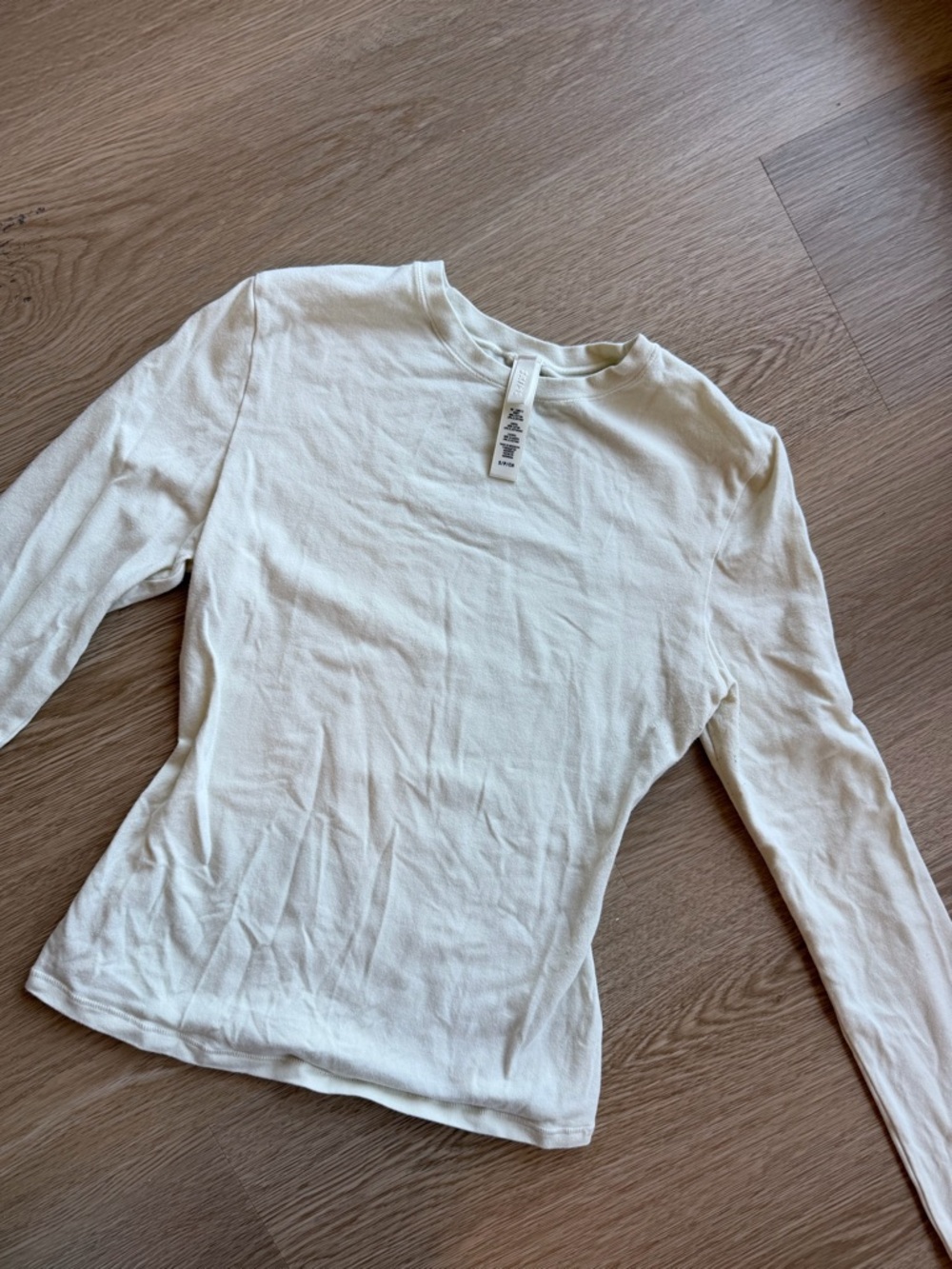 SKIMS Long-Sleeve Crewneck Top in Cream